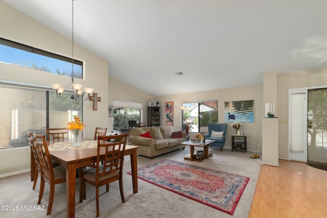 dining room with visible vents, baseboards, a chandelier, and wood finished floors