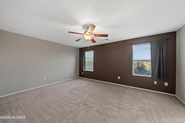 12272 W Reyher Farms Loop, Marana, AZ 85653 - carpeted spare room featuring healthy amount of natural light and a ceiling fan