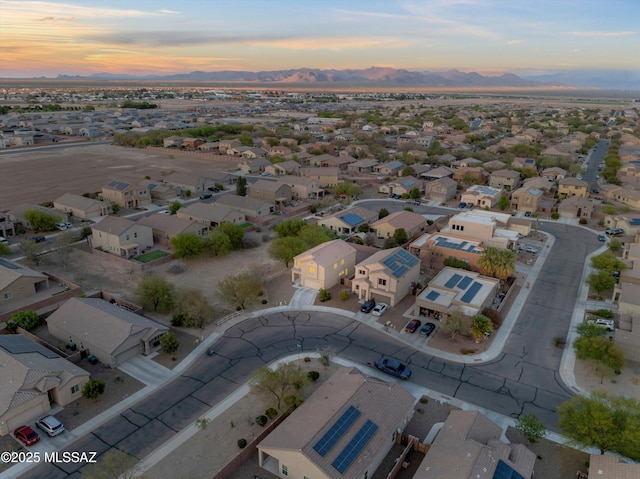 12272 W Reyher Farms Loop, Marana, AZ 85653 - aerial overview of property's location featuring a mountainous background and nearby suburban area