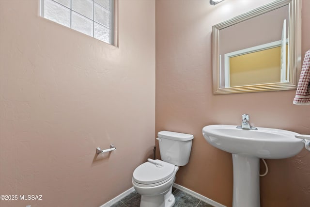 12272 W Reyher Farms Loop, Marana, AZ 85653 - bathroom featuring toilet and tile patterned flooring