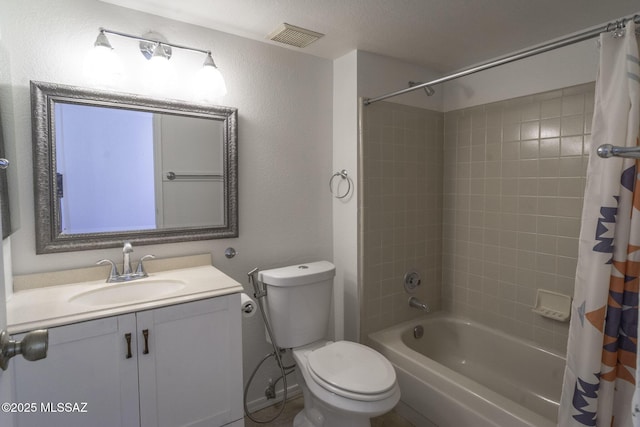 full bathroom featuring visible vents, shower / bath combo with shower curtain, toilet, and vanity