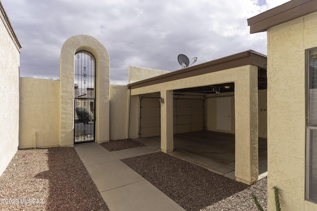 exterior space with a gate