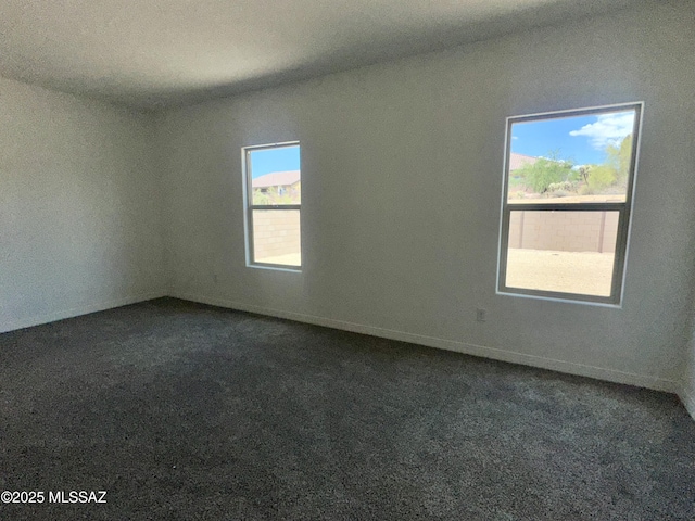 5448 W Summer View Dr, Marana, AZ 85658 - spare room featuring dark colored carpet