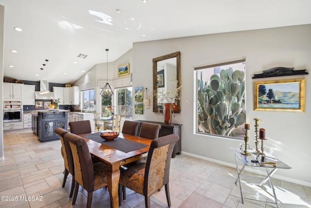 dining space featuring visible vents, recessed lighting, high vaulted ceiling, and baseboards
