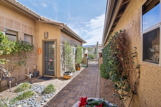 view of patio / terrace with a gate