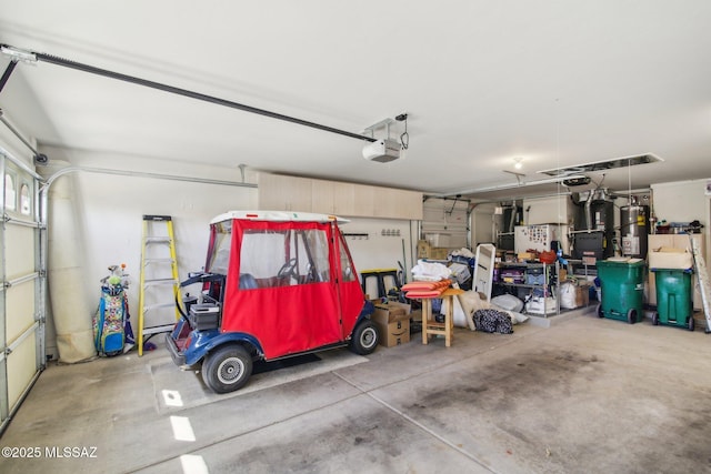 garage featuring a garage door opener, heating unit, and secured water heater