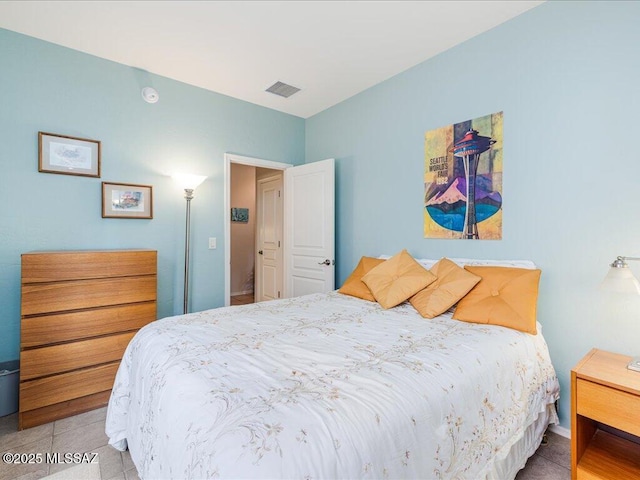 bedroom featuring visible vents