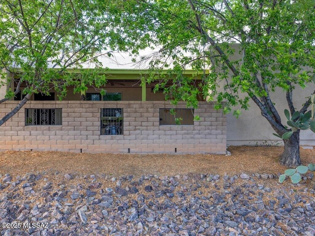 view of property exterior with stucco siding
