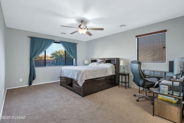 bedroom featuring visible vents, ceiling fan, carpet, and baseboards