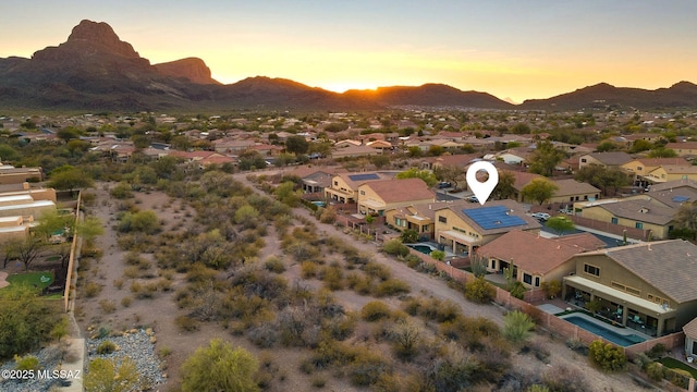 aerial view with a mountain view and a residential view
