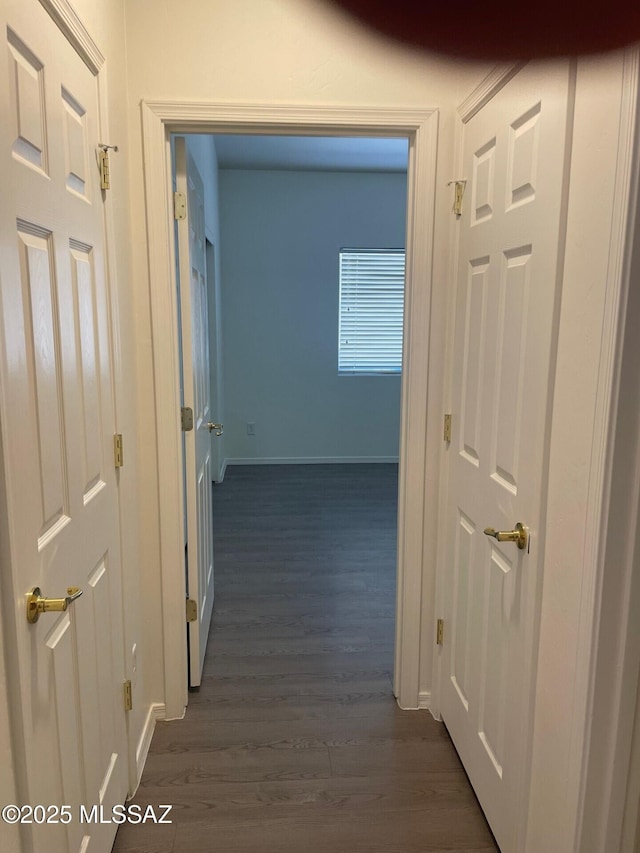 6610 S Via Molino De Viento, Tucson, AZ 85757 - corridor with dark wood-style floors and baseboards