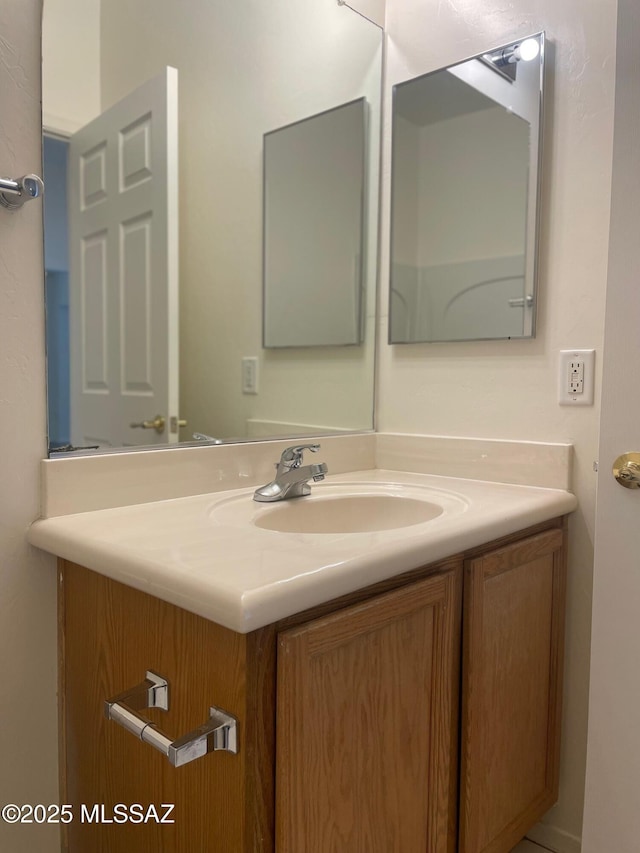 6610 S Via Molino De Viento, Tucson, AZ 85757 - bathroom featuring vanity