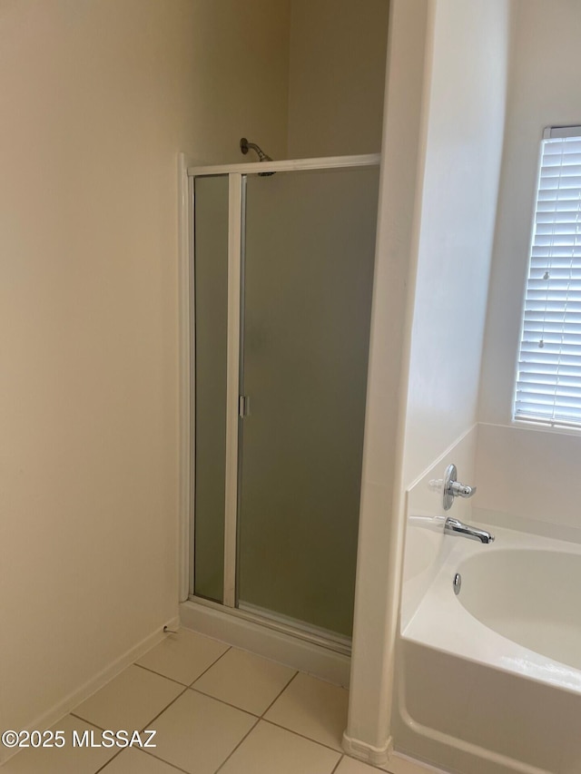 6610 S Via Molino De Viento, Tucson, AZ 85757 - full bath with a stall shower, a bath, tile patterned floors, and baseboards