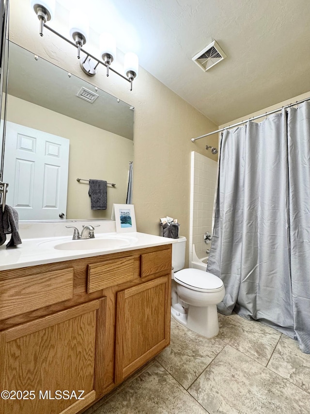 full bath featuring toilet, vanity, shower / bathtub combination with curtain, and visible vents