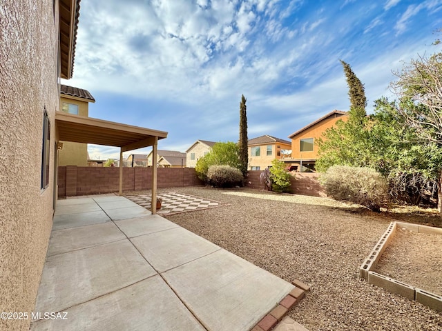 view of yard featuring a fenced backyard and a patio area