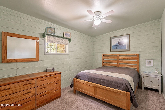 bedroom with carpet and a ceiling fan