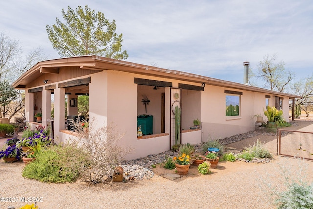 view of front of property featuring stucco siding