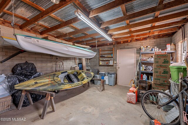 garage featuring concrete block wall