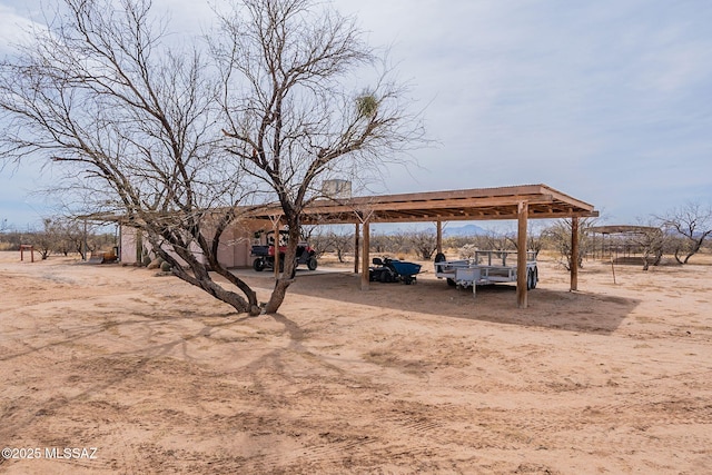 view of yard featuring a detached carport
