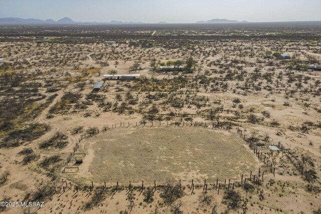 aerial view with a rural view, a mountain view, and a desert view