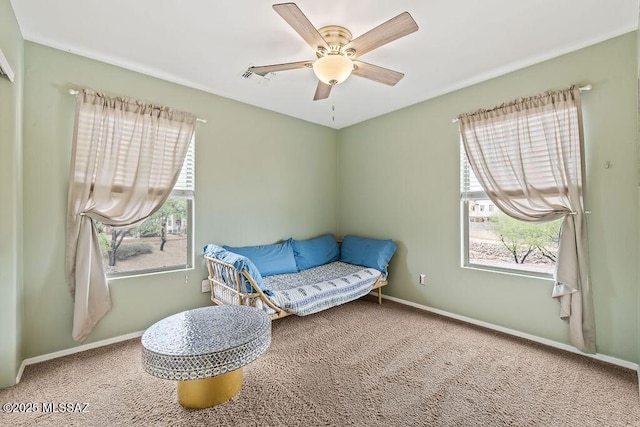 15046 S Harry Truman Pl, Sahuarita, AZ 85629 - sitting room with carpet, ceiling fan, and baseboards
