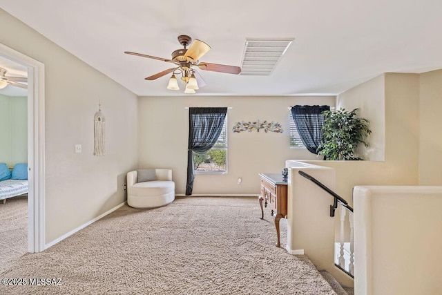 15046 S Harry Truman Pl, Sahuarita, AZ 85629 - sitting room with a ceiling fan, carpet floors, and baseboards