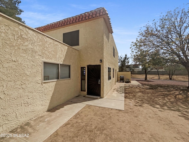 6588 Calle La Paz Unit C, Tucson, AZ 85715 - back of property with stucco siding
