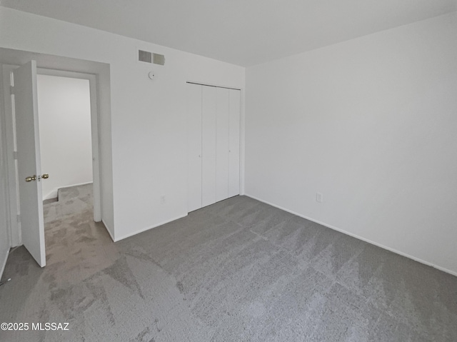 6588 Calle La Paz Unit C, Tucson, AZ 85715 - empty room with carpet flooring and visible vents