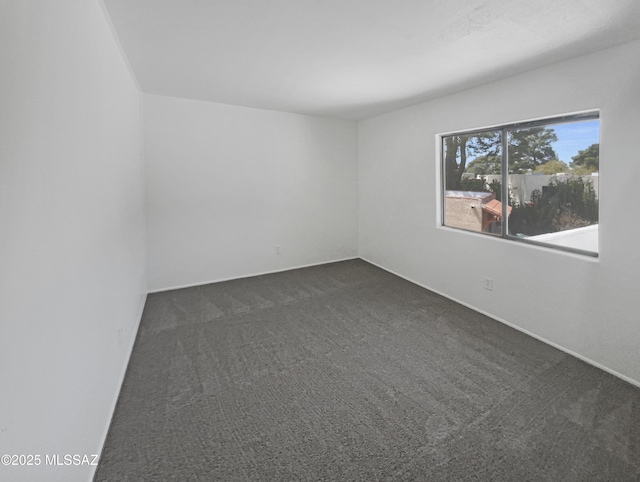 6588 Calle La Paz Unit C, Tucson, AZ 85715 - empty room with dark carpet