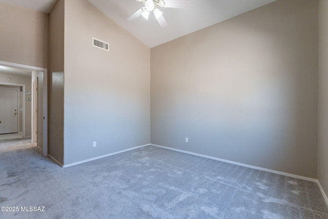 unfurnished room with visible vents, baseboards, a ceiling fan, and carpet floors
