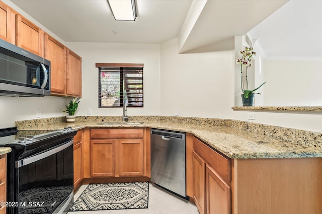 5751 N Kolb Rd Unit 2101, Tucson, AZ 85750 - kitchen with appliances with stainless steel finishes, a sink, light stone countertops, and brown cabinetry