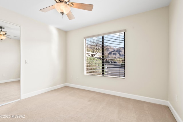 5751 N Kolb Rd Unit 2101, Tucson, AZ 85750 - empty room with ceiling fan, light colored carpet, and baseboards