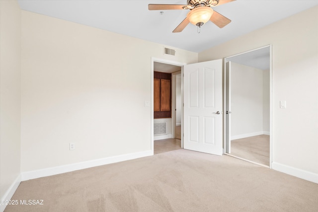 5751 N Kolb Rd Unit 2101, Tucson, AZ 85750 - unfurnished bedroom featuring carpet flooring, baseboards, and ceiling fan