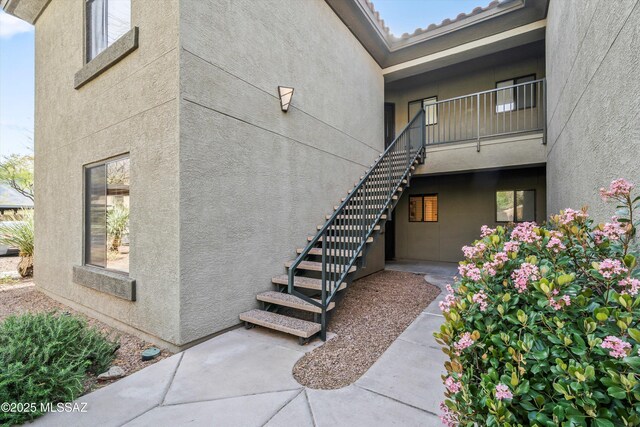 5751 N Kolb Rd Unit 2101, Tucson, AZ 85750 - view of exterior entry featuring stucco siding