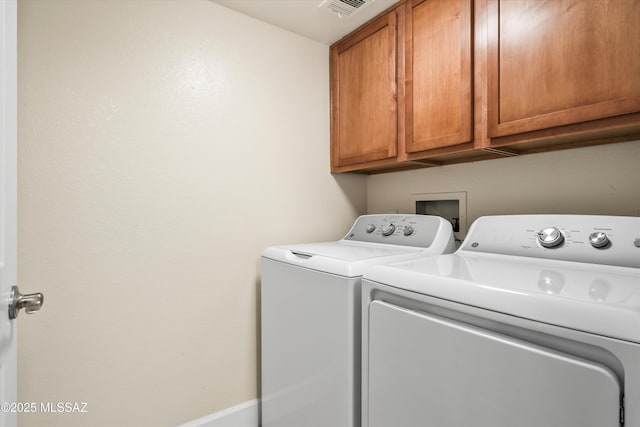 5751 N Kolb Rd Unit 2101, Tucson, AZ 85750 - laundry area featuring washer and clothes dryer and cabinet space