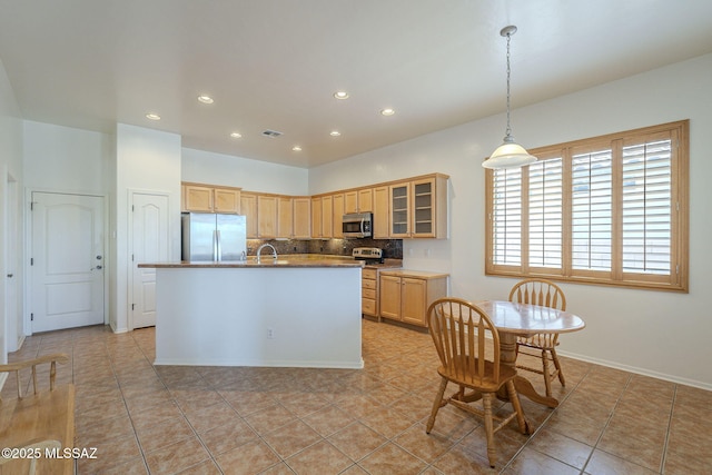 kitchen featuring tasteful backsplash, stainless steel appliances, recessed lighting, and visible vents