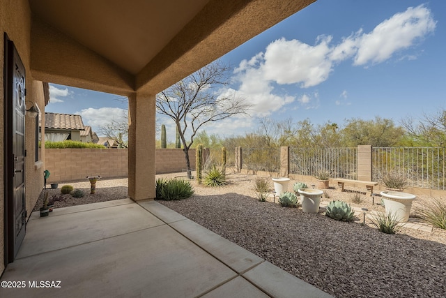 view of patio with a fenced backyard