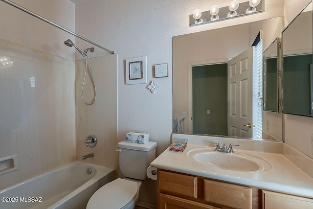 full bath with toilet, vanity, and bathing tub / shower combination