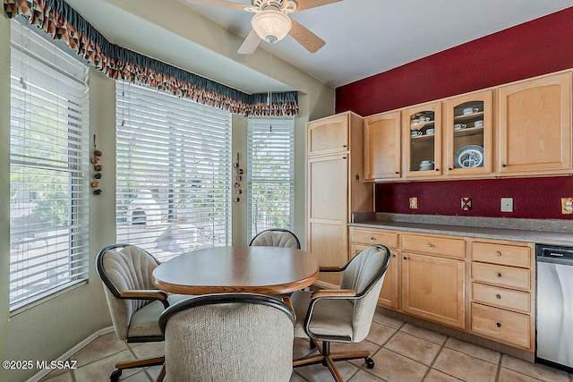 dining room featuring light tile patterned flooring and ceiling fan
