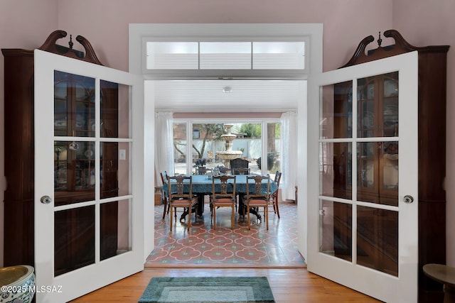 dining room with wood finished floors