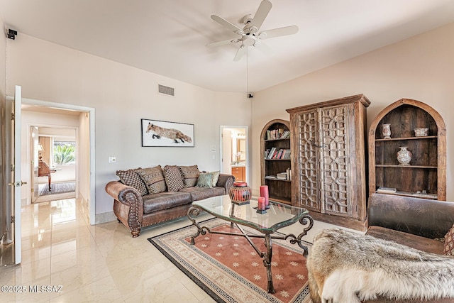 living room featuring marble finish floor, ceiling fan, and visible vents