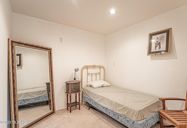 bedroom featuring recessed lighting and light carpet