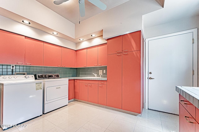 washroom featuring a sink, washer and clothes dryer, ceiling fan, and recessed lighting