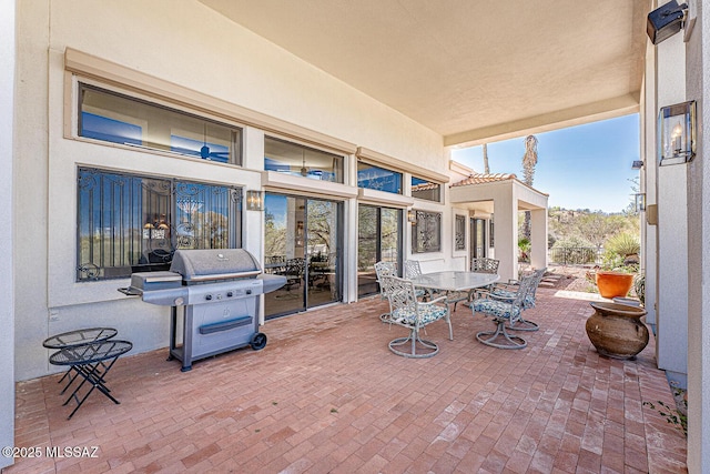 view of patio featuring outdoor dining space and area for grilling