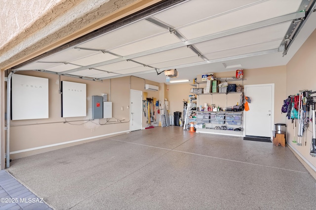 14082 N Tiyo Point Trl, Marana, AZ 85658 - garage with electric panel, an AC wall unit, and a garage door opener
