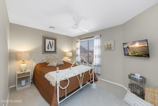 bedroom featuring carpet floors, baseboards, ceiling fan, and visible vents