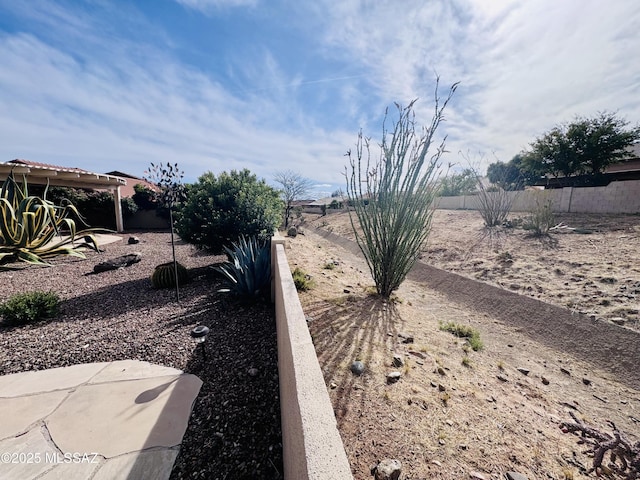view of yard featuring fence