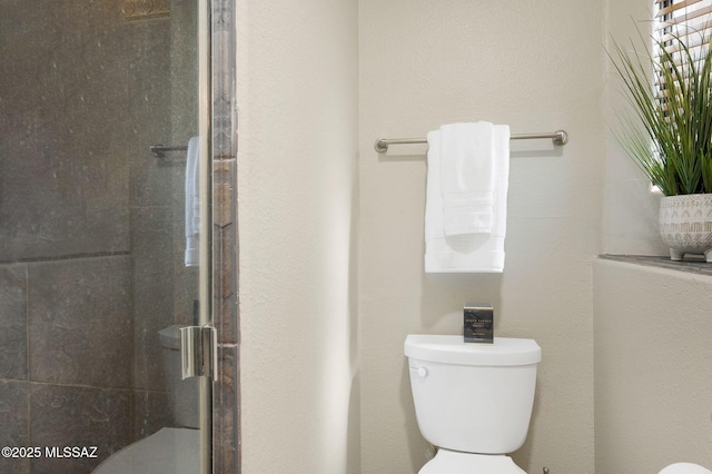 6655 N Canyon Crest Dr Unit 23102, Tucson, AZ 85750 - bathroom with toilet and a stall shower