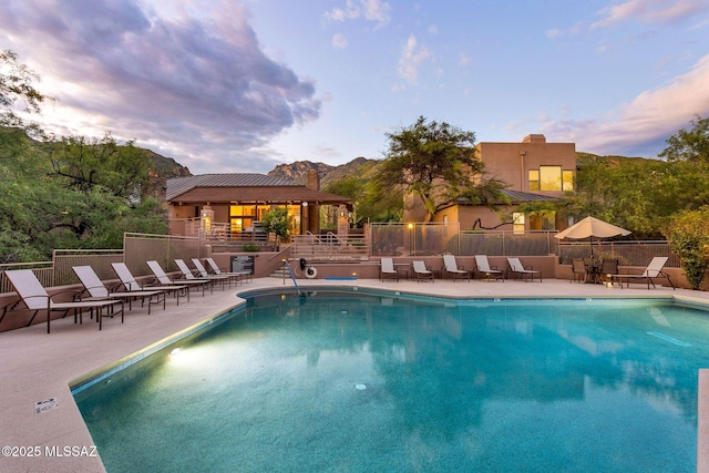 6655 N Canyon Crest Dr Unit 23102, Tucson, AZ 85750 - community pool featuring a patio area