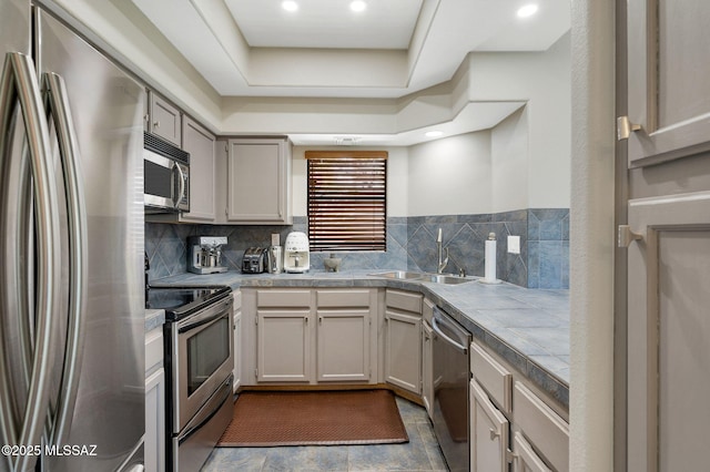 6655 N Canyon Crest Dr Unit 23102, Tucson, AZ 85750 - kitchen featuring stainless steel appliances, a sink, backsplash, and recessed lighting